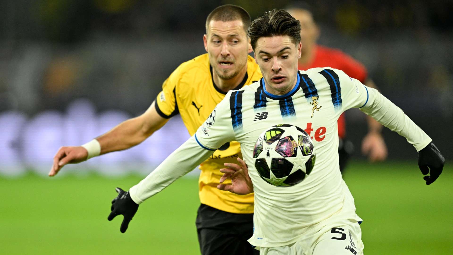 Dortmund's German defender #03 Waldemar Anton and Atalanta's Polish midfielder #59 Nicola Zalewski